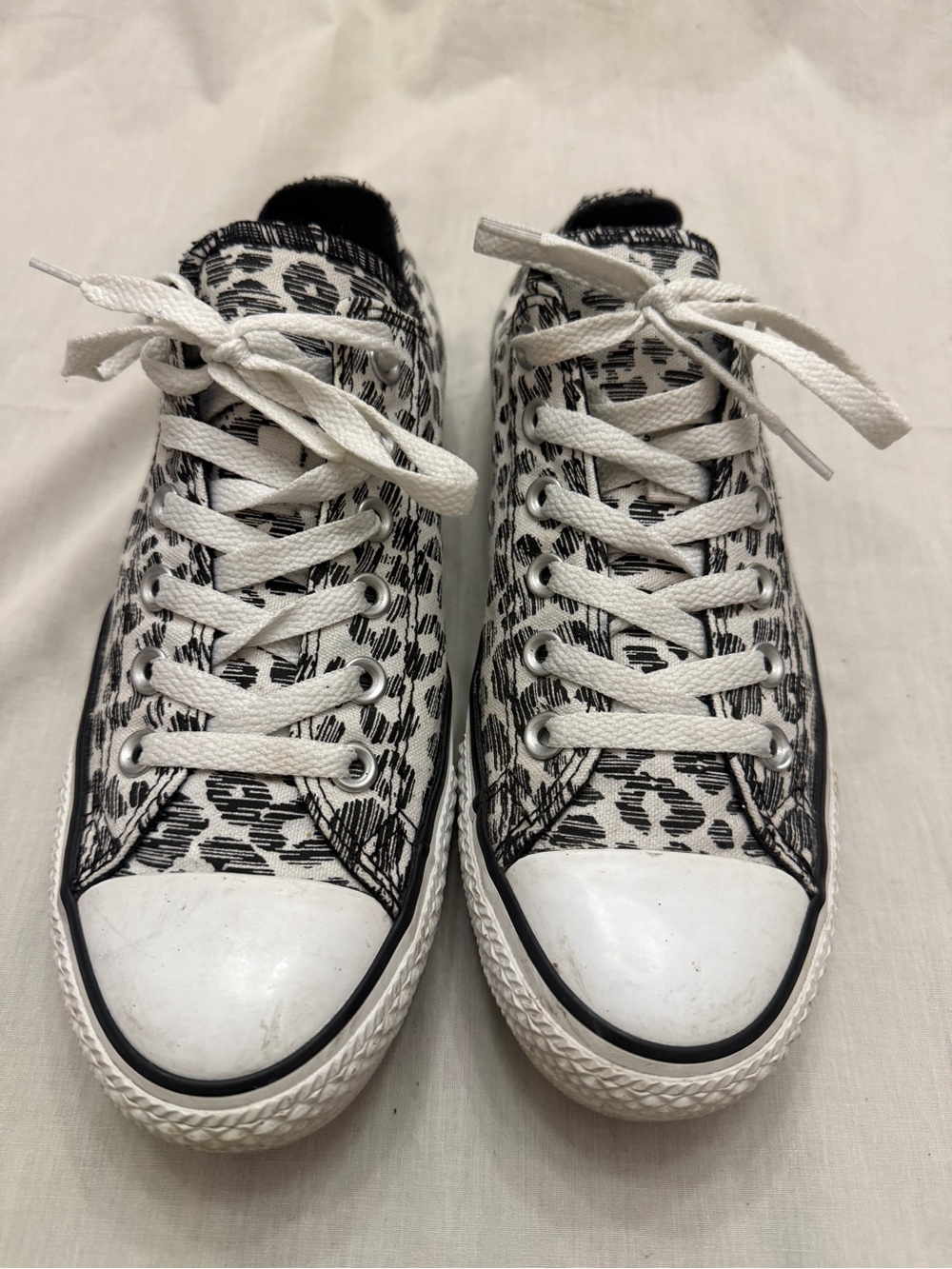 Converse Low-Top Canvas Sneakers in White and Black Leopard Print